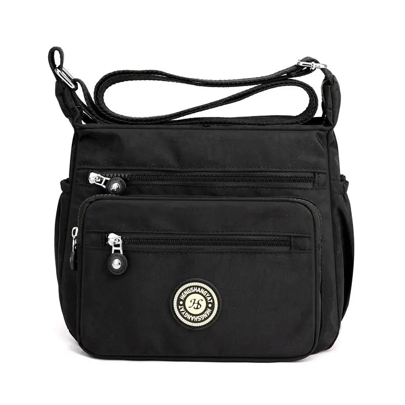 the black nylon bag with a zipper closure