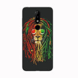 a close up of a cell phone with a lion on it