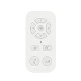 Remote control with directional pad and function buttons.