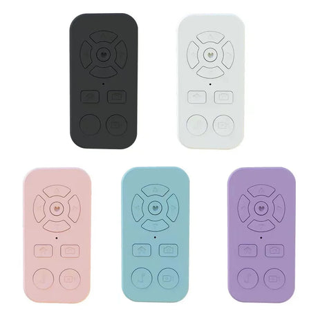 Remote controls in five different pastel colors.