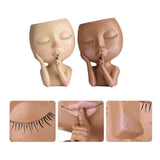 the doll is made of clay and has long eyelashes