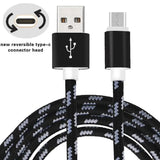 a close up of a black and white braided usb cable