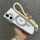 Rhinestone-accented phone case with wrist strap.