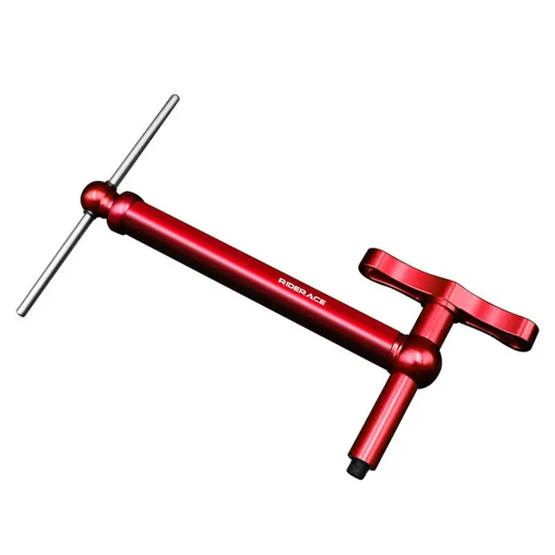 a red tool with a handle on it