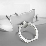 a silver ring with a white background