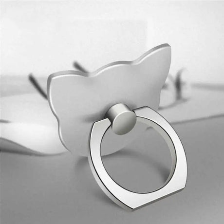 a silver ring with a white background