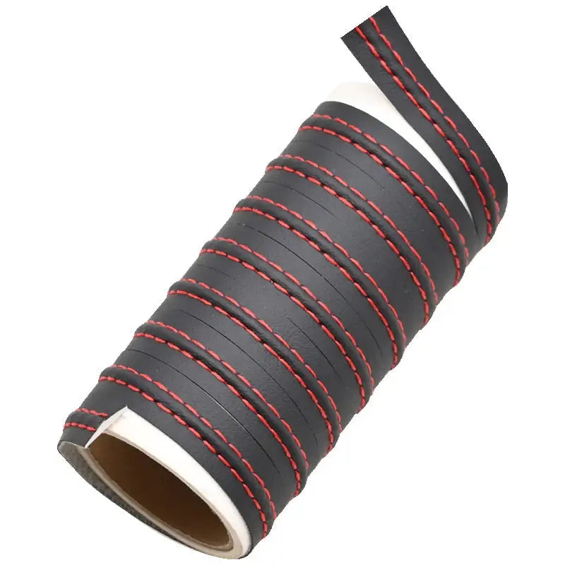 a roll of black and red leather cord