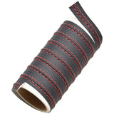 a roll of black and red leather cord