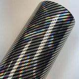 a roll of black and silver reflective vinyl with a pattern