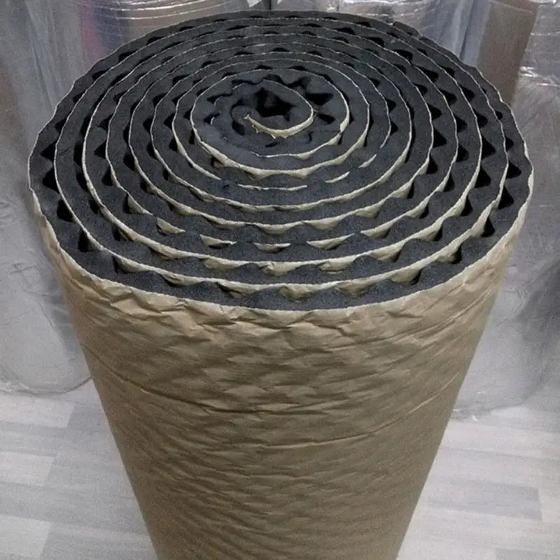 a large roll of black and white paper with a spiral design