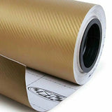 a close up of a roll of gold metallic foil on a white background