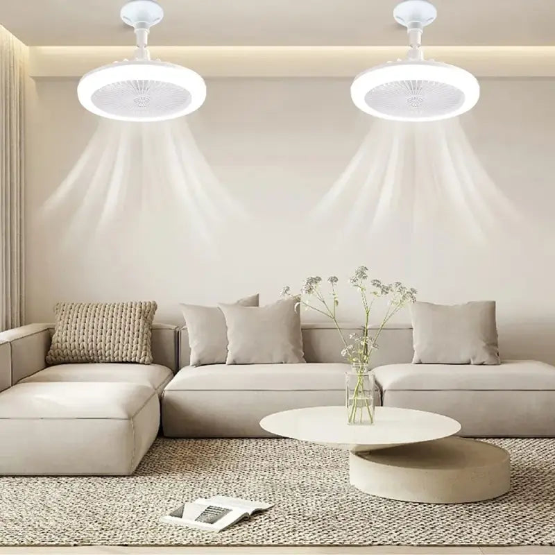 a living room with a couch, coffee table and two lamps