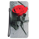 a red rose on a wooden background wallet case