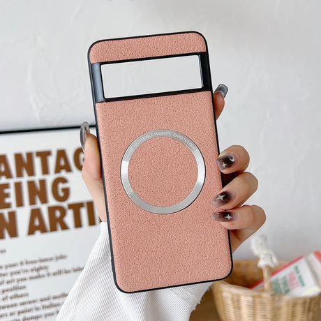 Rose gold smartphone case with a circular cutout and a rectangular window at the top.