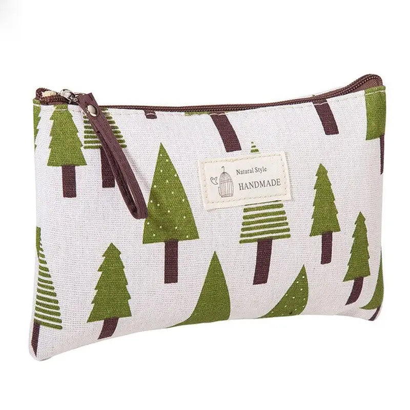 a small pouch bag with a christmas tree print