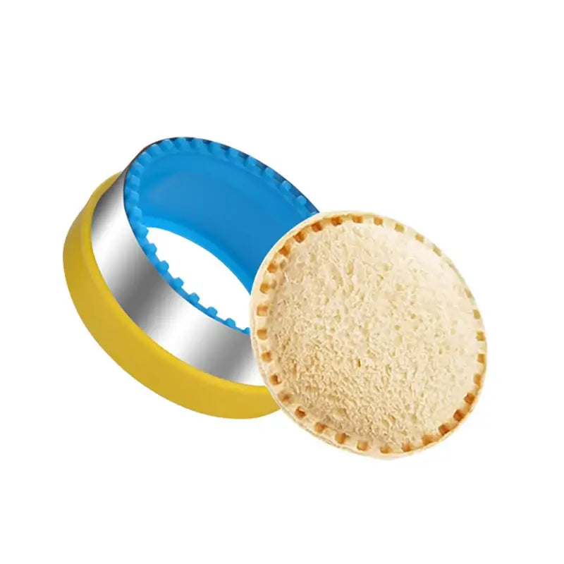 A round cookie with a blue lid and a yellow rim