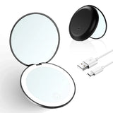 a round mirror with a charging cable attached to it