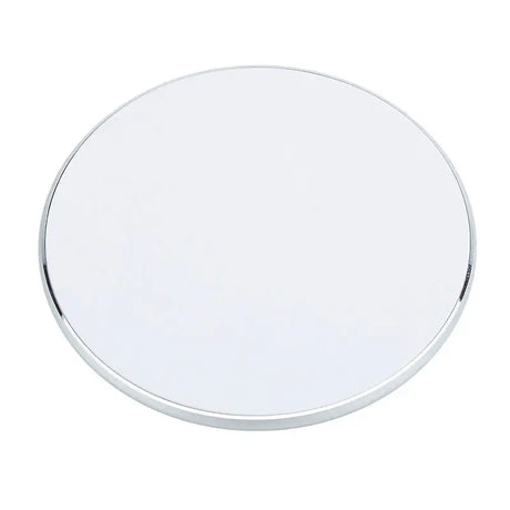 a round mirror with a white background