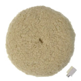 a white wool ball with a small metal clip