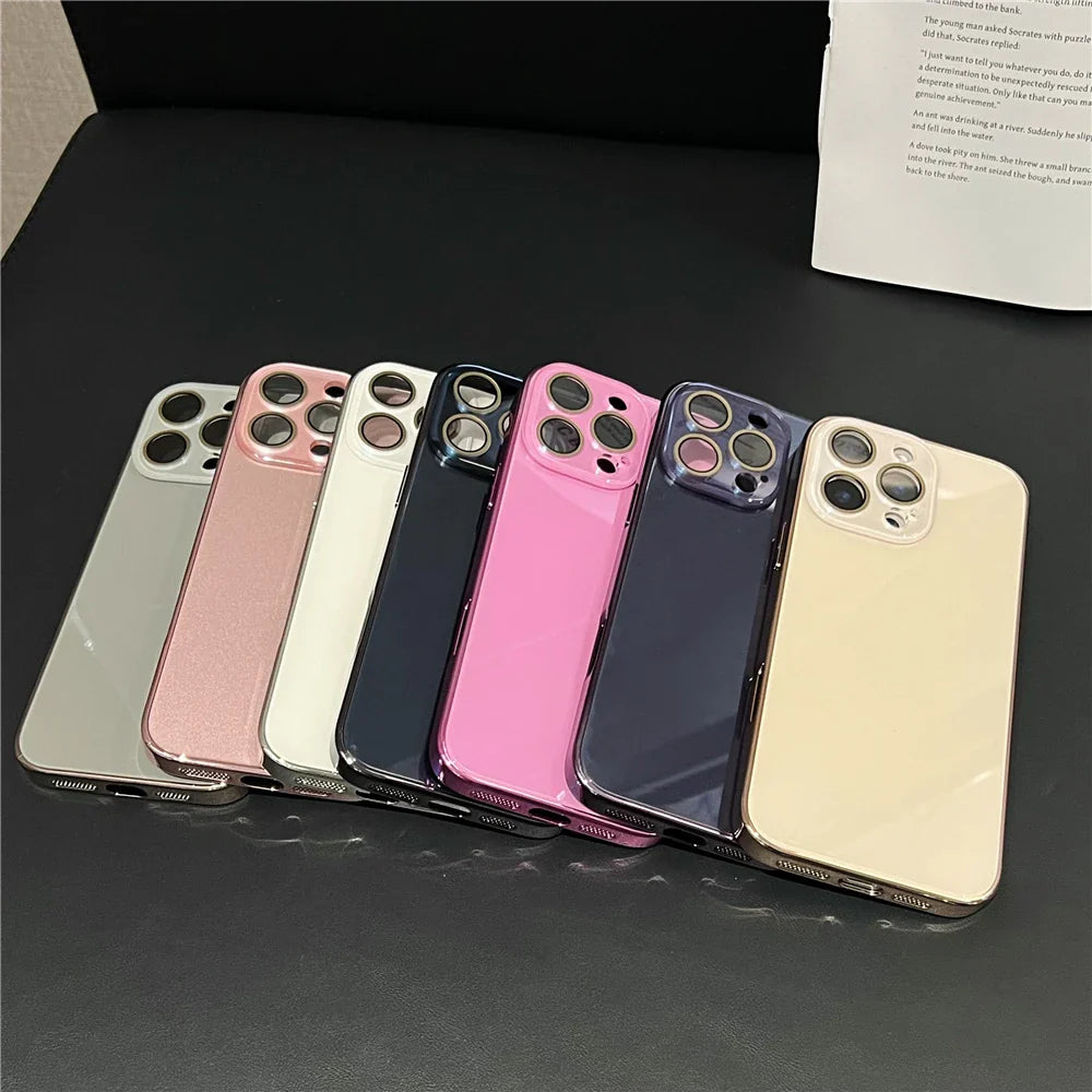 A row of seven colorful smartphone cases with camera cutouts.