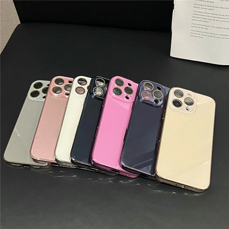 A row of seven colorful smartphone cases with camera cutouts.