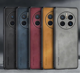 Row of smartphones in different colors showcasing their rear camera designs.