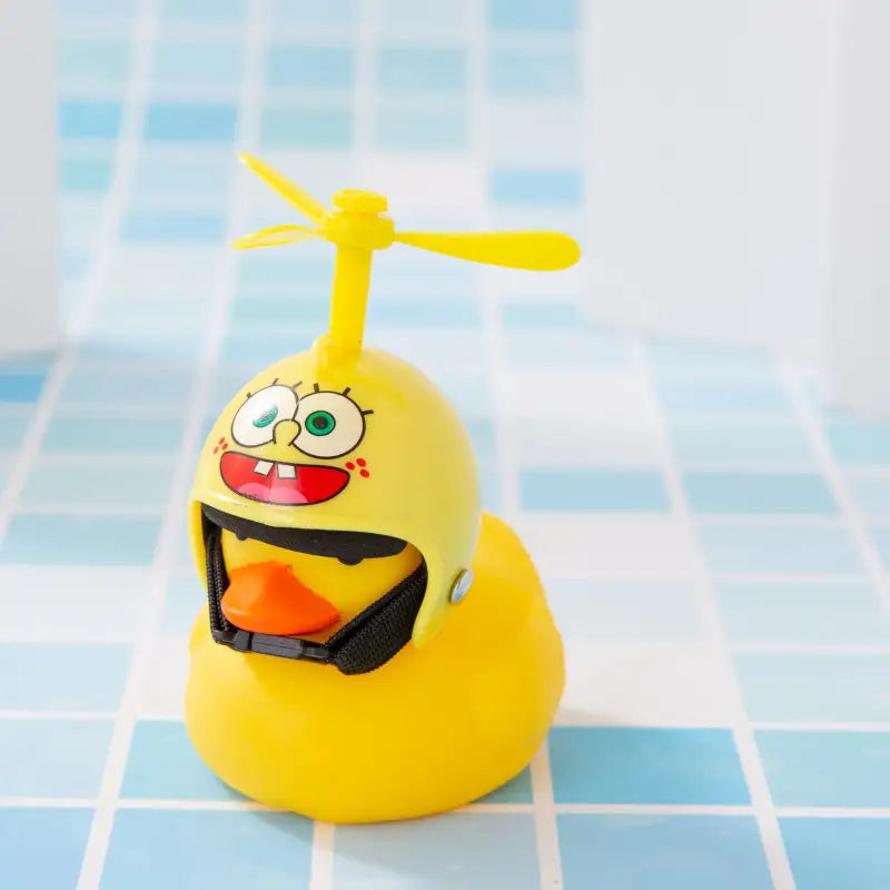 a rubber duck with a propeller on its head