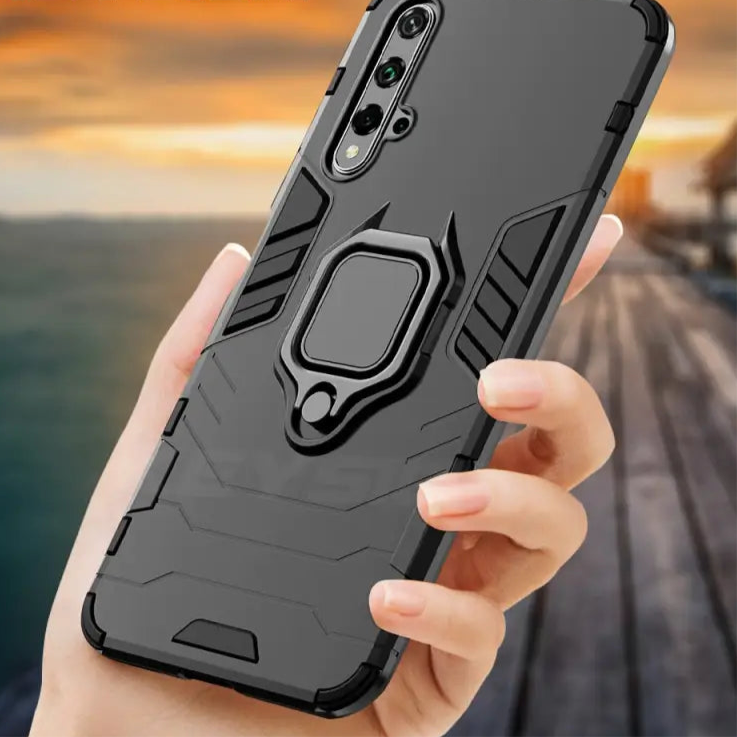 Rugged black smartphone case with a built-in ring holder and camera cutouts.