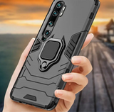 Rugged smartphone case with a built-in ring holder and multiple camera cutouts.