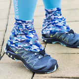 a person wearing blue camouflage socks and blue leggings