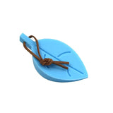 a blue toy boat with a rope on it