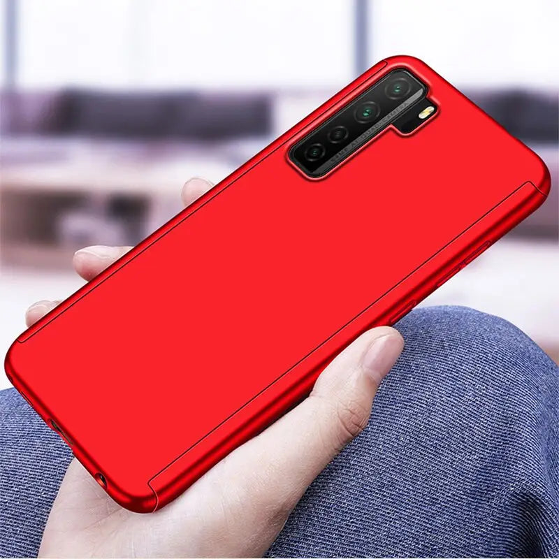 the red samsung case is held in a hand