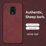 the back of a red samsung phone case with the text, `,’’, ’, ’,