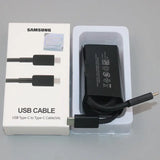 a close up of a box with a charger and a cable