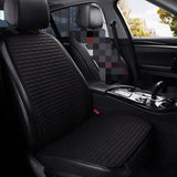 the interior of a car with black leather seats