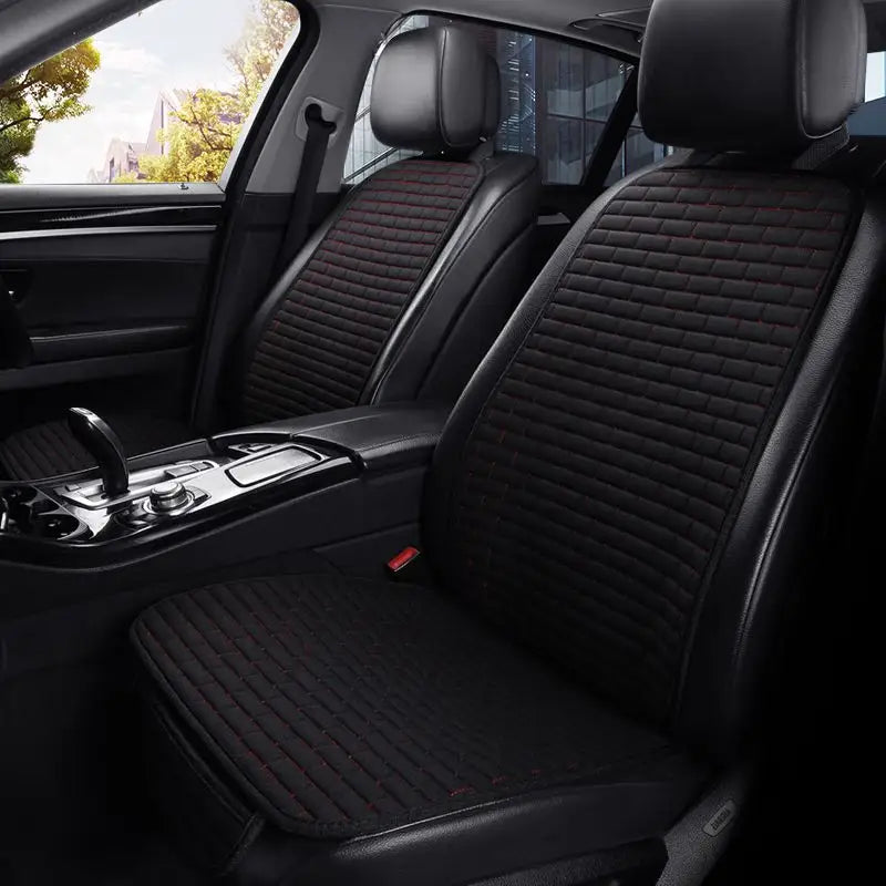 the interior of a car with black leather seats