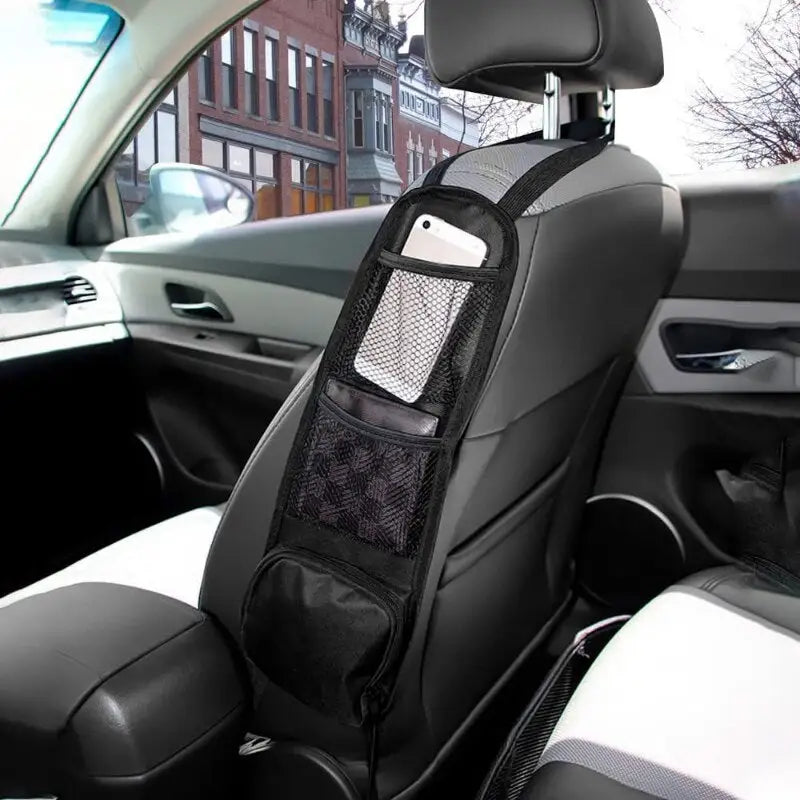 a close up of a car seat with a back pocket