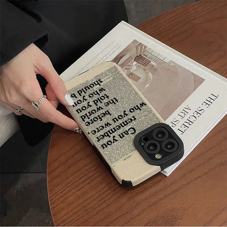 a woman is holding a book with a book cover