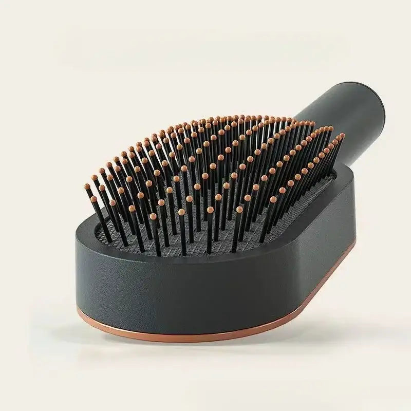 the brush brush is a black brush with a wooden handle