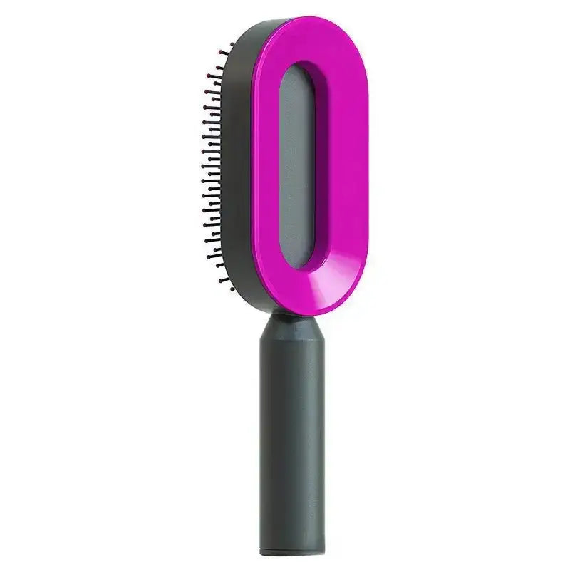 a purple brush with a black handle