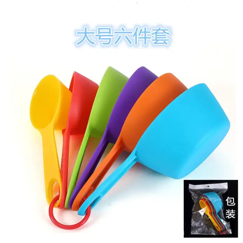 a set of colorful plastic spoons and spats