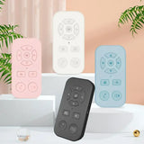 Set of colorful remote controls with minimalist designs and circular button layouts.
