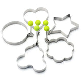 a set of cookie cutters with a tennis ball