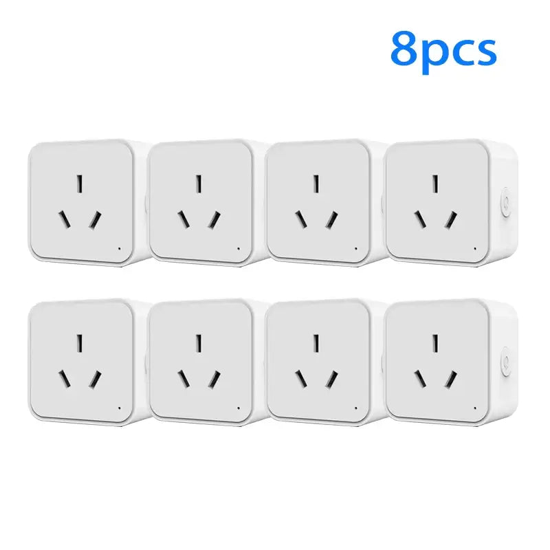 a set of eight white electrical outlets with black wires