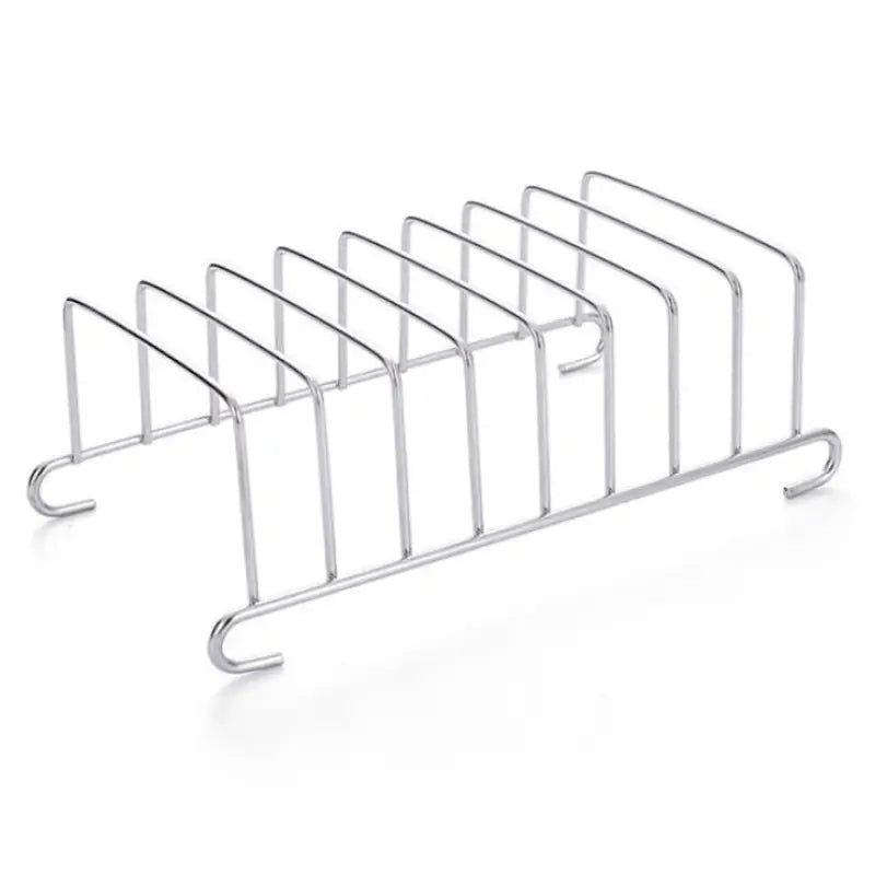 a set of four chrome steel magazine racks