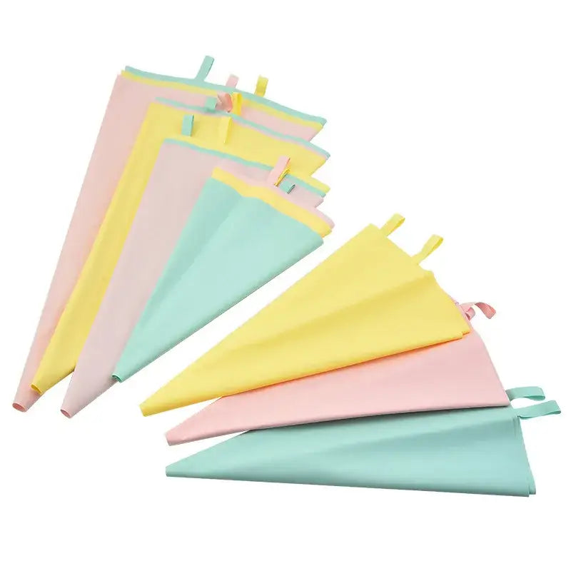 a set of four paste colored paper napkins
