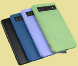 Set of smartphone cases in different colors (black, blue, purple, and green).