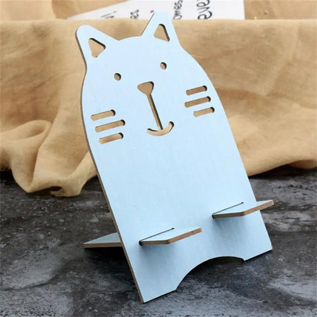 a paper cat with a hole in the middle