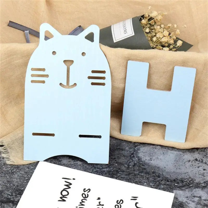 a cat shaped card with the word hello