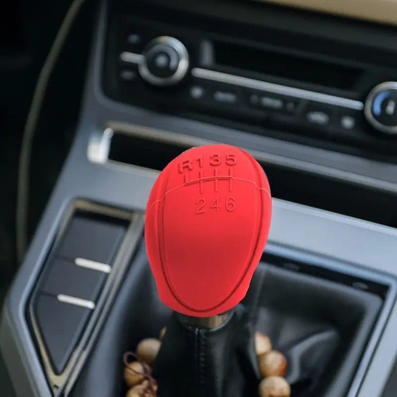 a red shift knob in a car